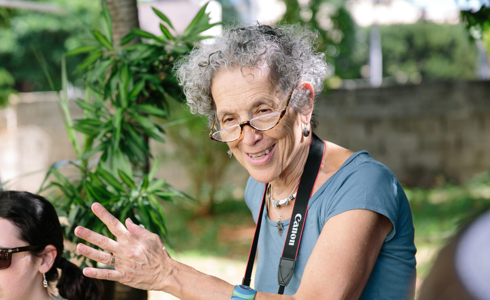 Ruth Messinger holding a camera